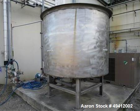 Used Tank, Approximately 1,000 Gallon, Stainless steel.  Used as a Chilled water tank, 6' dia, 5' high, with connectingpumps