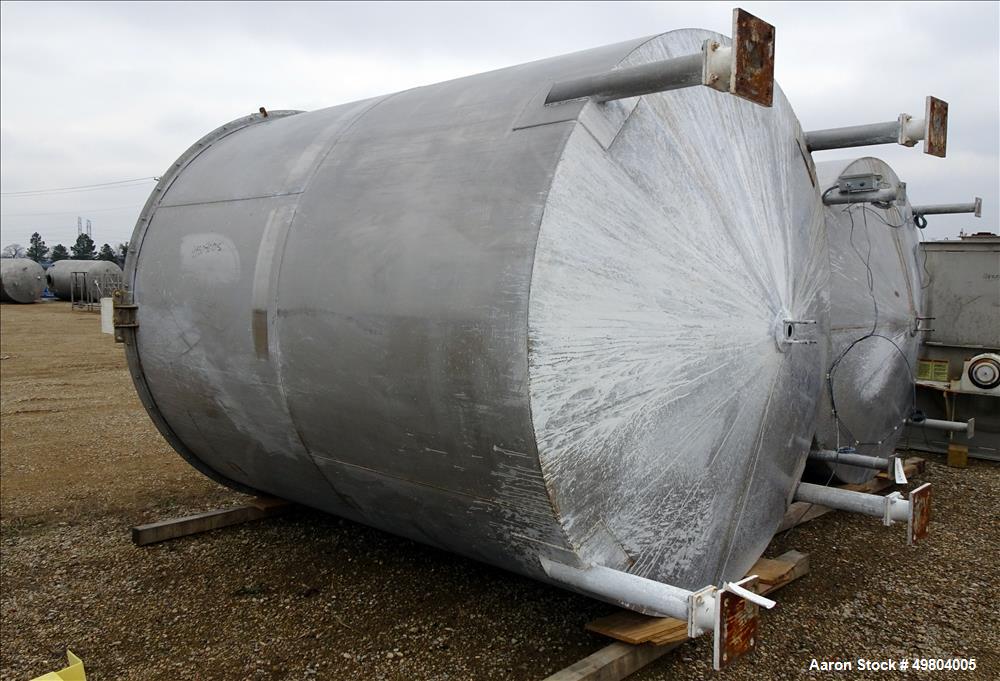 Used- Bright Sheet Metal Tank, Approximately 4,000 Gallon, 304 Stainless Steel