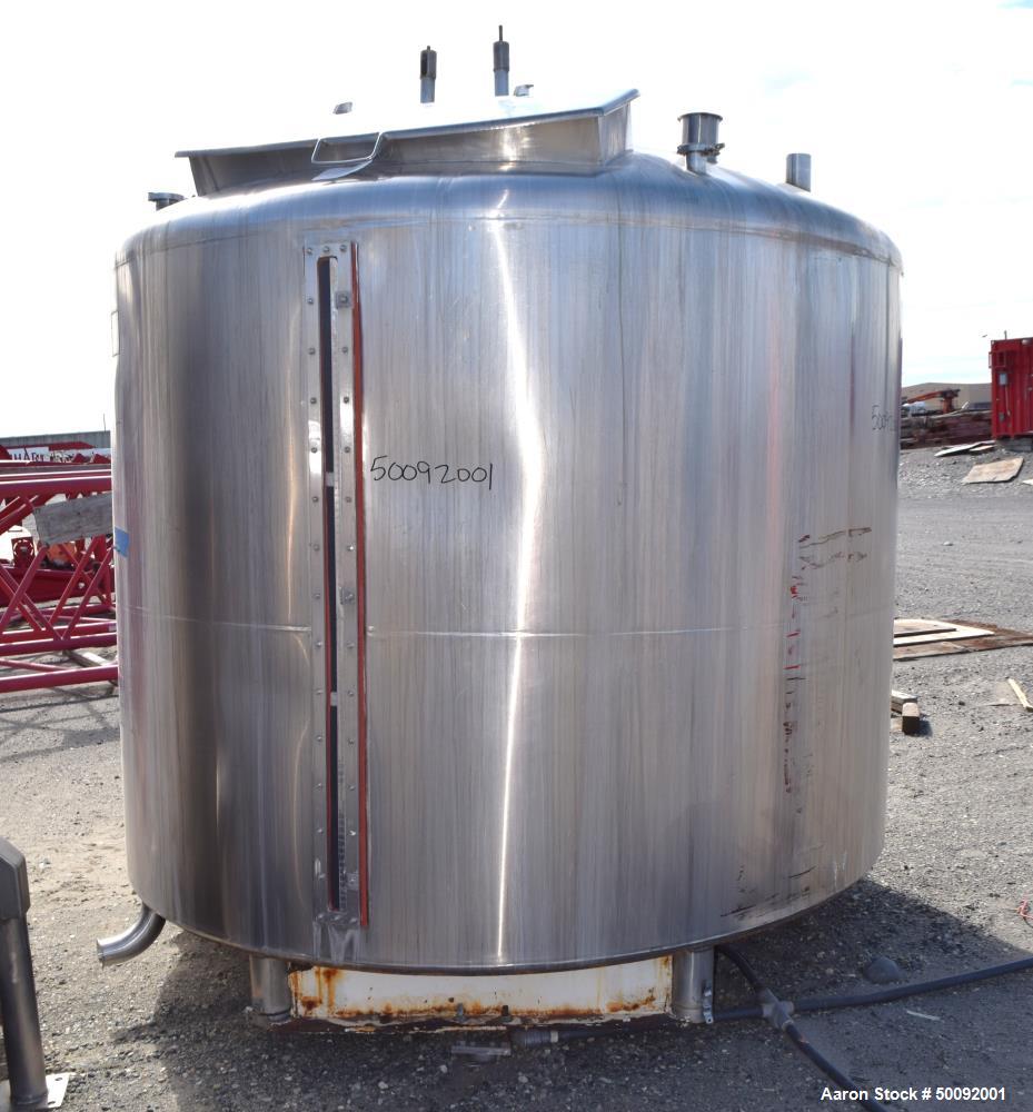 Used- Tank, Approximate 2000 Gallon, Stainless Steel, Vertical.