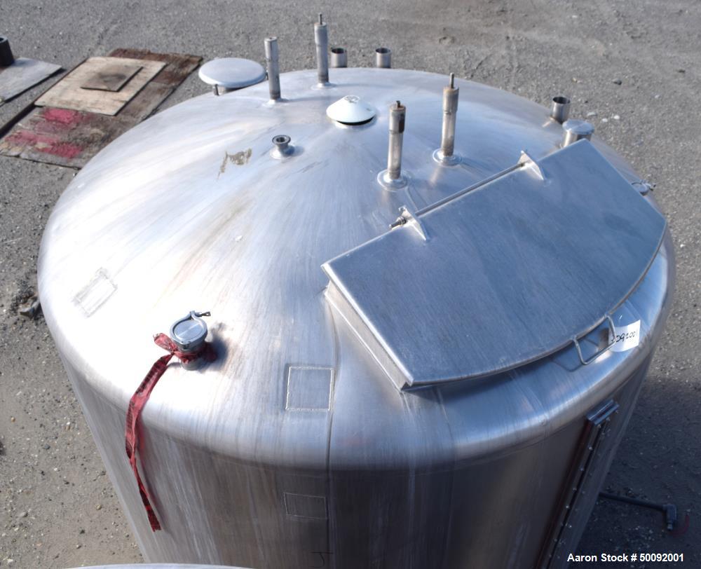 Used- Tank, Approximate 2000 Gallon, Stainless Steel, Vertical.