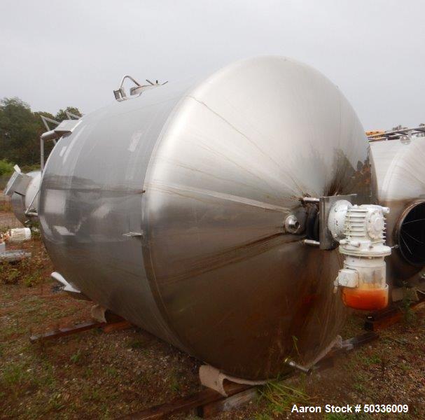 Used Cherry Burrell Mix Tank, Approximately 1,700 Gallon, Stainless Steel. Approximate 84" diameter x 75" straight side, dished top and bottom. Top center-mounted agitator driven by a 2 hp, 3/60/230/...