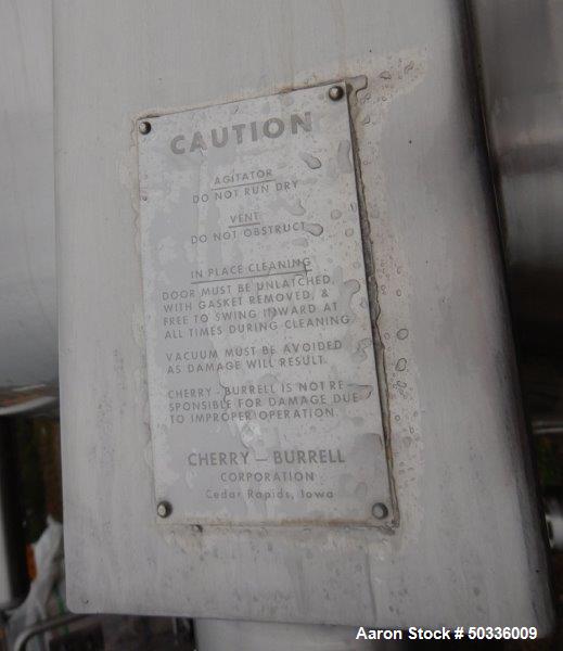 Used Cherry Burrell Mix Tank, Approximately 1,700 Gallon, Stainless Steel. Approximate 84" diameter x 75" straight side, dished top and bottom. Top center-mounted agitator driven by a 2 hp, 3/60/230/...