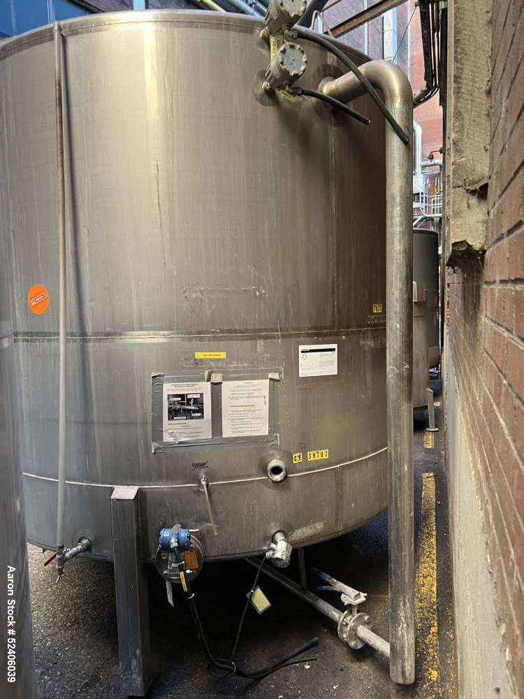 Used Falco Tank, Approximate 2500 Gallon, 304 Stainless Steel, Vertical. Approximate 96" diameter x 84" straight side, coned top & bottom. Mounted on 4 stainless legs. Serial# 2912,