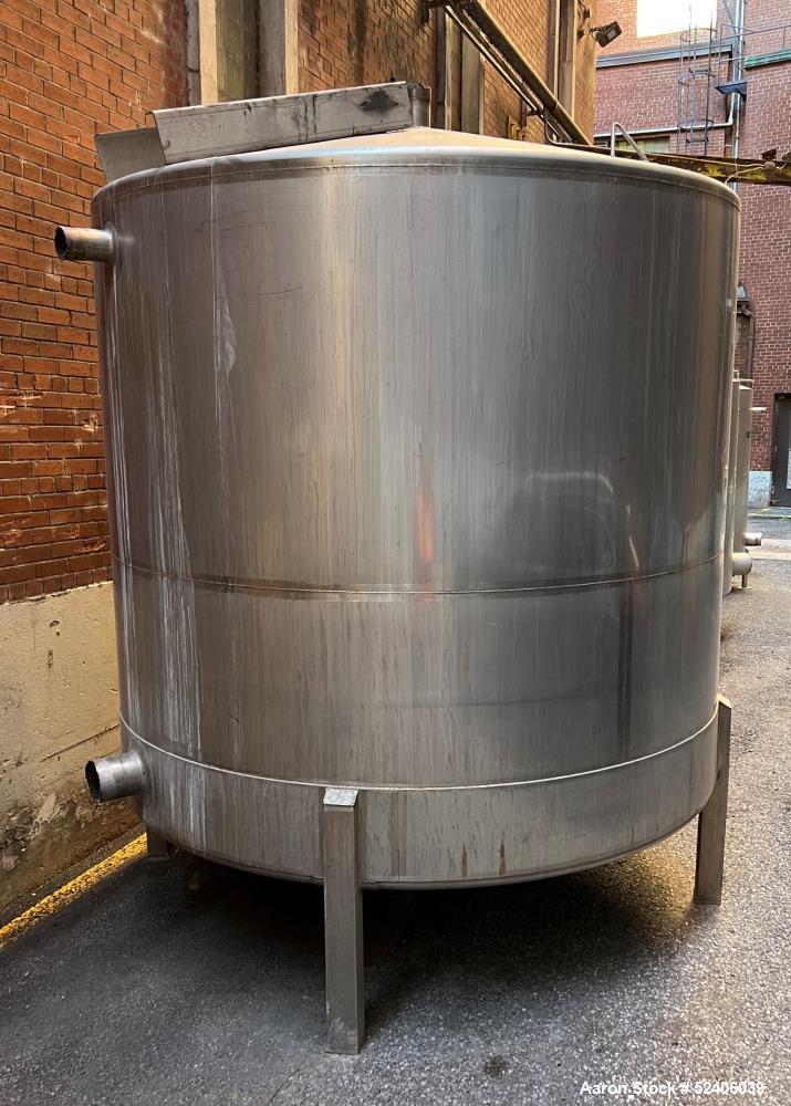 Used Falco Tank, Approximate 2500 Gallon, 304 Stainless Steel, Vertical. Approximate 96" diameter x 84" straight side, coned top & bottom. Mounted on 4 stainless legs. Serial# 2912,
