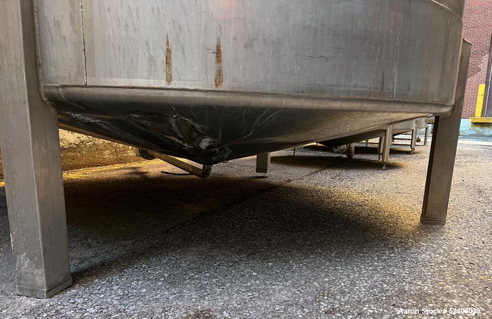 Used Falco Tank, Approximate 2500 Gallon, 304 Stainless Steel, Vertical. Approximate 96" diameter x 84" straight side, coned top & bottom. Mounted on 4 stainless legs. Serial# 2912,