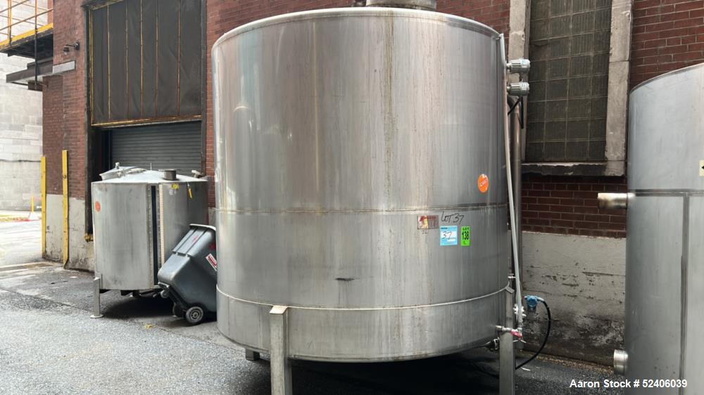 Used Falco Tank, Approximate 2500 Gallon, 304 Stainless Steel, Vertical. Approximate 96" diameter x 84" straight side, coned top & bottom. Mounted on 4 stainless legs. Serial# 2912,