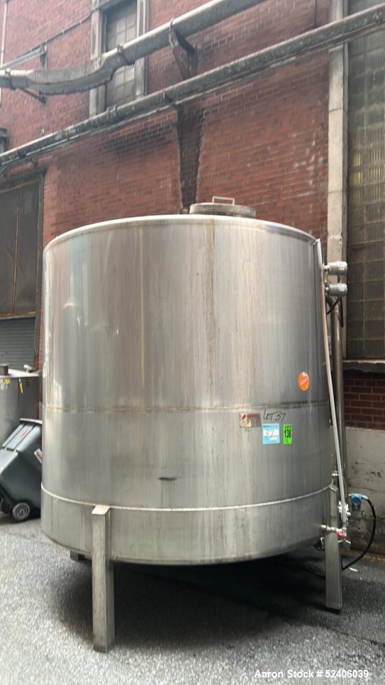 Used Falco Tank, Approximate 2500 Gallon, 304 Stainless Steel, Vertical. Approximate 96" diameter x 84" straight side, coned top & bottom. Mounted on 4 stainless legs. Serial# 2912,