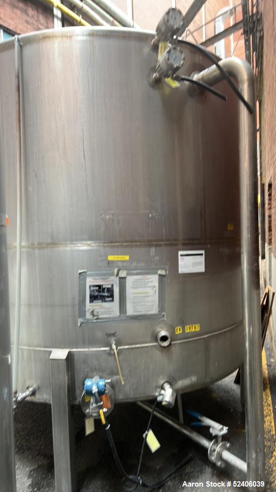 Used Falco Tank, Approximate 2500 Gallon, 304 Stainless Steel, Vertical. Approximate 96" diameter x 84" straight side, coned top & bottom. Mounted on 4 stainless legs. Serial# 2912,