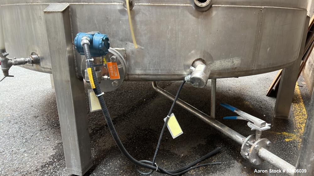 Used Falco Tank, Approximate 2500 Gallon, 304 Stainless Steel, Vertical. Approximate 96" diameter x 84" straight side, coned top & bottom. Mounted on 4 stainless legs. Serial# 2912,