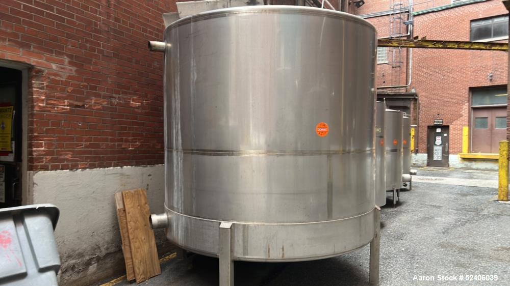 Used Falco Tank, Approximate 2500 Gallon, 304 Stainless Steel, Vertical. Approximate 96" diameter x 84" straight side, coned top & bottom. Mounted on 4 stainless legs. Serial# 2912,