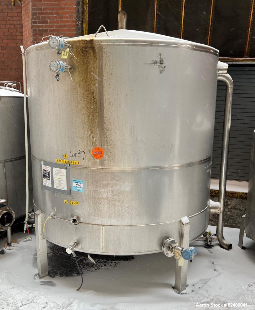 Used Falco Tank, Approximate 2500 Gallon, 304 Stainless Steel, Vertical. Approximate 96" diameter x 84" straight side, coned top & bottom. Mounted on 4 stainless legs. Serial# 2912.