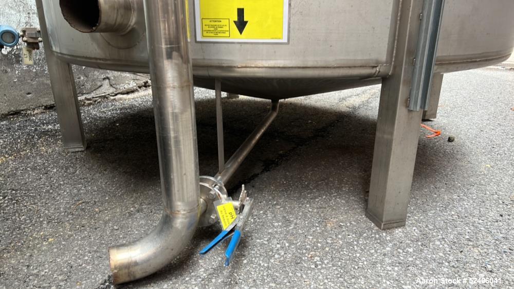 Used Falco Tank, Approximate 2500 Gallon, 304 Stainless Steel, Vertical. Approximate 96" diameter x 84" straight side, coned top & bottom. Mounted on 4 stainless legs. Serial# 2912.