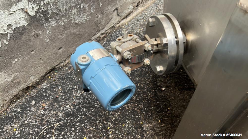 Used Falco Tank, Approximate 2500 Gallon, 304 Stainless Steel, Vertical. Approximate 96" diameter x 84" straight side, coned top & bottom. Mounted on 4 stainless legs. Serial# 2912.
