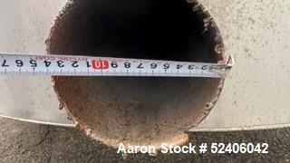 Used Tank, Approximate 1800 Gallon, Stainless Steel, Vertical. Approximate 84" diameter x 72" straight side, coned top & bottom. Mounted on 6 stainless legs.