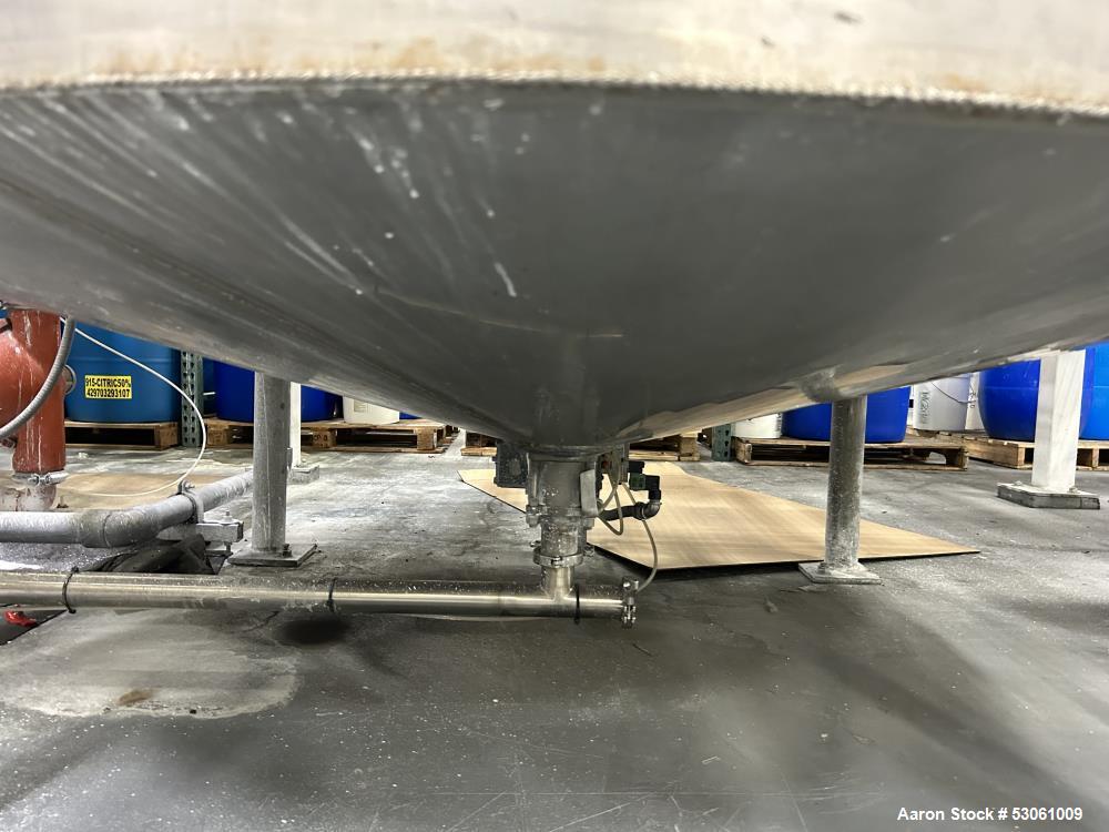 Used 3,000 Gallon Mix Tank, W/ agitation, approx. 3" shaft, 4 blade trubine, with 3 baffles. Flat top w/ 2 hinge cover. Cone bottom (approx 10"). 2" center bottom outlet. Approx. 108" straight side, ...