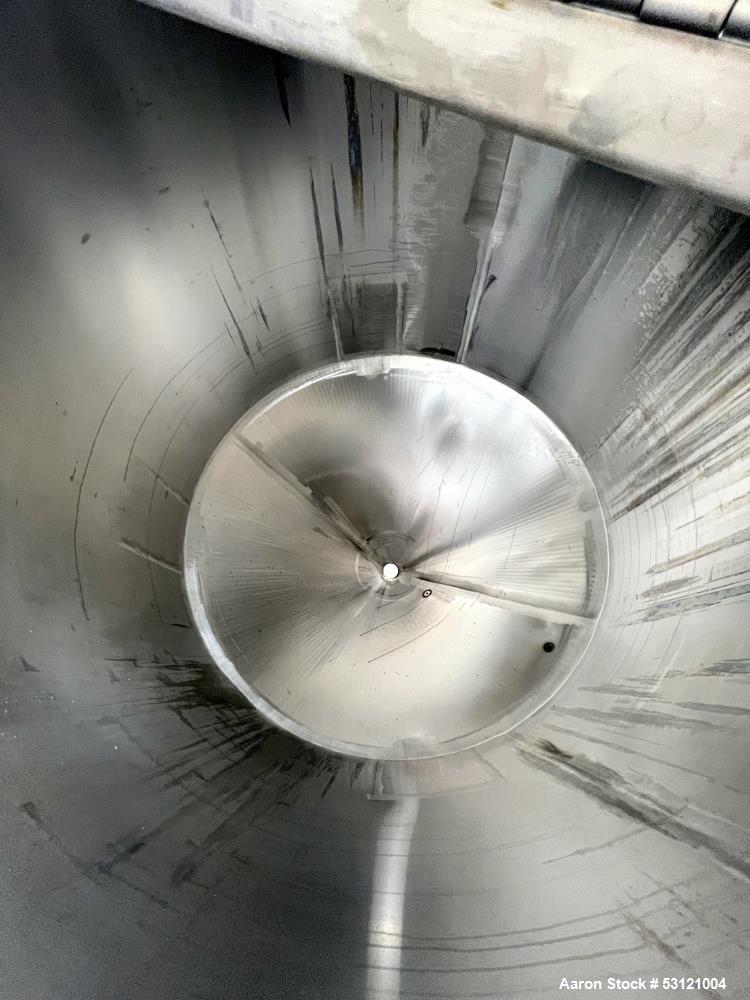 Used Stainless Steel Tank, Approximate 1,300 Gallon, Stainless Steel, Vertical. Approximate 80" diameter x 60" straight side. Flat top with cover, Conical bottom. 4" Center bottom outlet. Mounted on ...