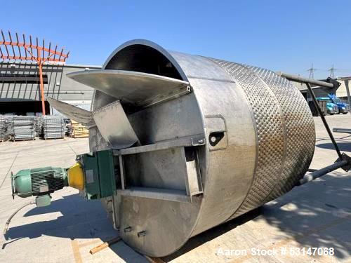 Used 3,000 Gallon 316 Stainless Steel Agitated Dimple Jacketed Mix Tank. Vessel measures 8' diameter X 8' straight side with slight cone bottom leading to 3" diameter discharge. Includes multiple zon...