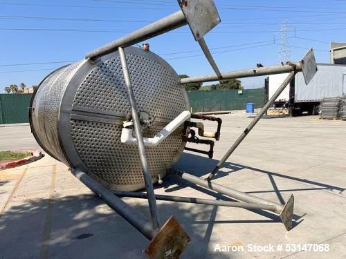 Used 3,000 Gallon 316 Stainless Steel Agitated Dimple Jacketed Mix Tank. Vessel measures 8' diameter X 8' straight side with slight cone bottom leading to 3" diameter discharge. Includes multiple zon...