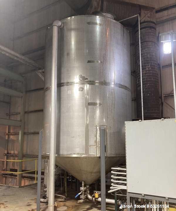 Used Approximate 4000 gallon Stainless Steel Storage Tank With 7.5 HP Centrifugal Pump, V-4782.  Misc. top inlets. Cone bottom with center bottom outlet. Bottom side manway. With 7.5 HP stainless ste...