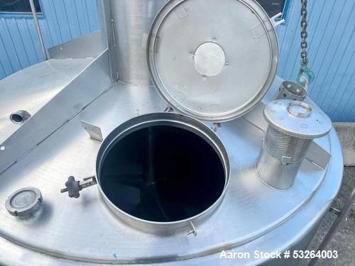 1720 Gallon Jacketed, 316 Stainless Steel Tank with 10HP Mixer.