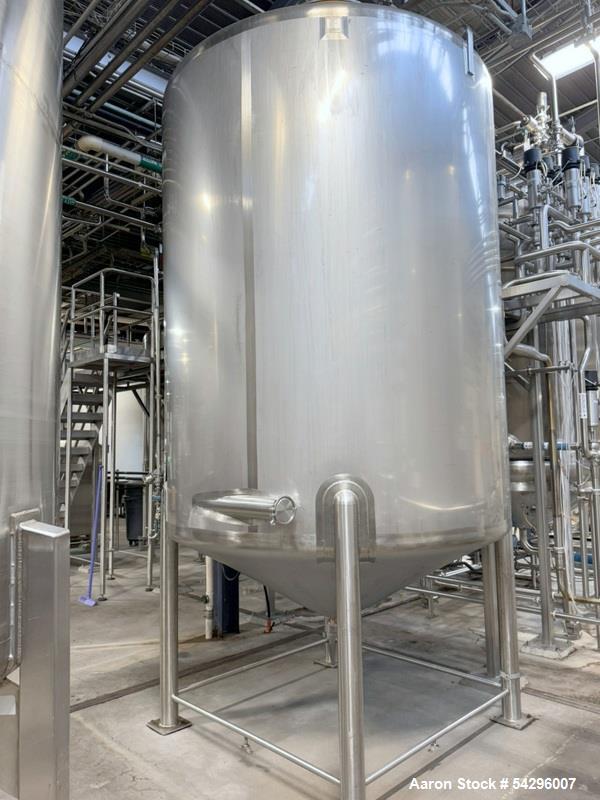 Used Stainless Steel Jacketed Tank, Approximate 2,500 Gallon.  Vertical, dish top, cone bottom, center bottom outlet, on (4) stainless steel legs.