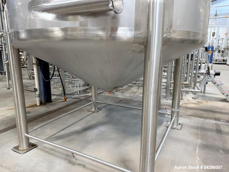 Used Stainless Steel Jacketed Tank, Approximate 2,500 Gallon.  Vertical, dish top, cone bottom, center bottom outlet, on (4) stainless steel legs.