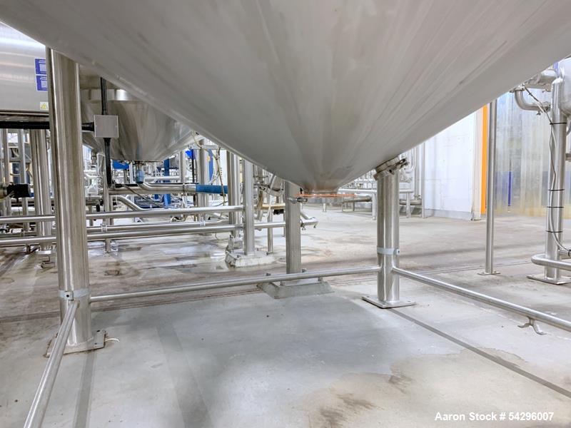 Used Stainless Steel Jacketed Tank, Approximate 2,500 Gallon.  Vertical, dish top, cone bottom, center bottom outlet, on (4) stainless steel legs.
