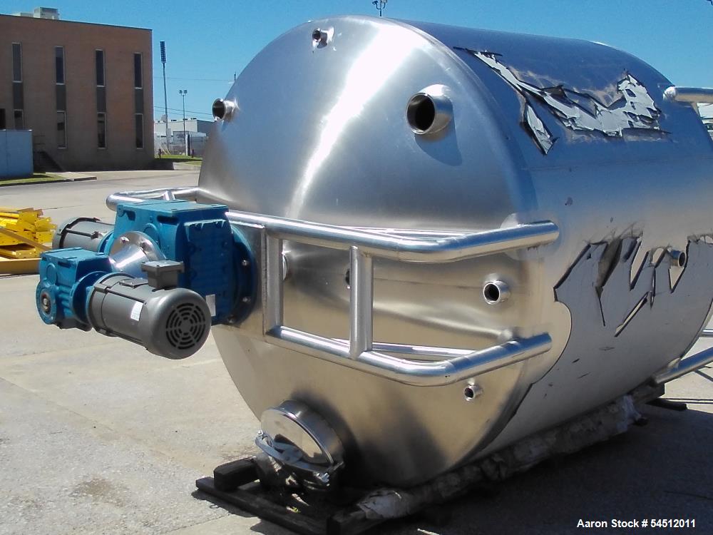Unused 2,000 Gallon Vertical Stainless Steel Agitated Tank. Dished top and bottom. Stainless steel top agitator bridge with counter rotating side scrape agitation. Top manway. Center bottom outlet. M...