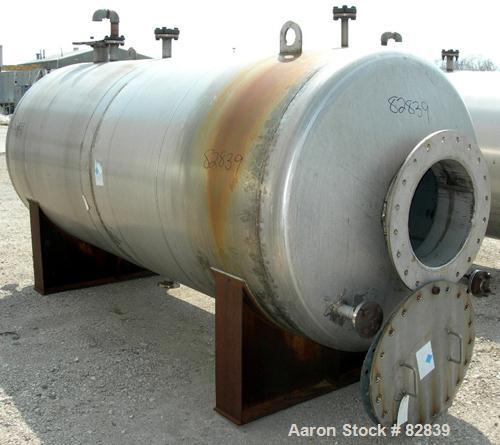USED: Tank, 1,250 gallon, 304 stainless steel, horizontal. 54" diameter x 120" straight side, dished ends. Openings: top (2) 2", 1", 4"; ends (4) 1-1/2", 2-1/2", 2", 17" manway, no cover; bottom 1-1/...