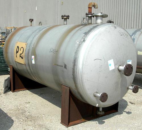 USED: Tank, 1,250 gallon, 304 stainless steel, horizontal. 54" diameter x 120" straight side, dished ends. Openings: top (2) 2", 1", 4"; ends (4) 1-1/2", 2-1/2", 2", 17" manway, no cover; bottom 1-1/...
