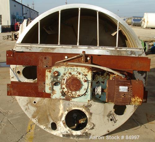 USED: 1000 gallon 304 stainless steel vertical mixing tank. 66" diameter x 72-1/2" straight side. Bridge mounted gearmotor, 7-1/2 hp, 3/60/460 volt, 1755 rpm, with Lightnin agitator, 16.8:1 ratio. Ou...