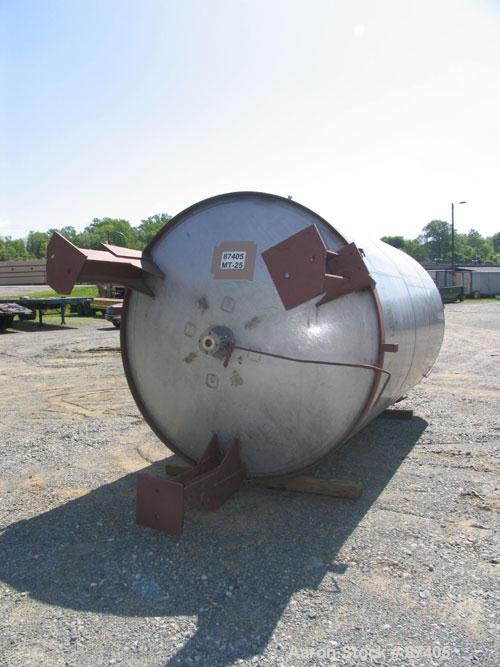 USED: Tank, 2800 gallon, 304 stainless steel. 6'6" diameter x 11'1" straight side, open top, dish bottom, non-jacketed. Vertical, 3 legs, 2" center bottom outlet. Bridge mounted top mounted Lightnin ...