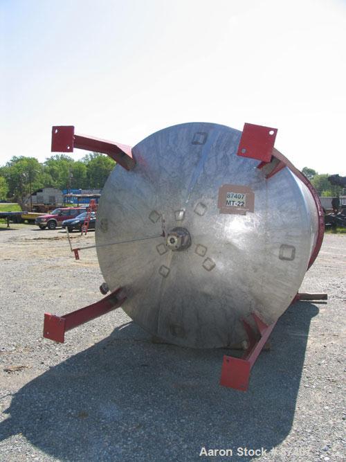USED: Tank, 2775 gallon, 316 stainless steel. 7'6" diameter x 9'6" straight side, vertical, 4 legs, 2" center bottom outlet. 3 hp Lightnin agitator, 2" shaft with steady bearing, flat top with manway...