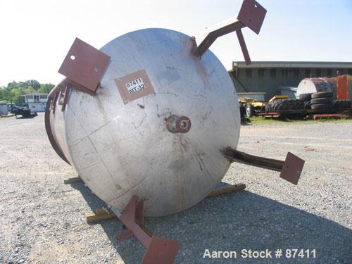 USED: Tank, 2403 gallon, 316 stainless steel. 6'6" diameter x 9'7" straight side, flat top, dish bottom, internal atmospheric, internal coils, vertical, with 3 hp Philadelphia top mount agitator, 2" ...