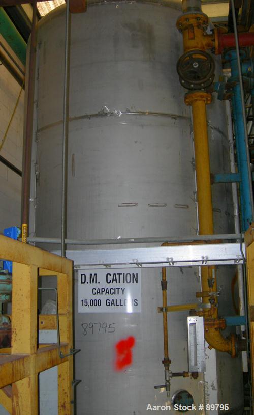 USED: Approximate 3750 gallon stainless steel storage tank. Vertical, dished heads. Approximately 7' diameter x 12' straight side. Mounted on 4 I-beam stainless steel legs. 6" CBO.