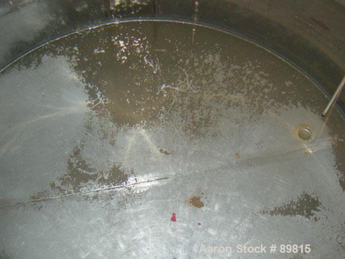 USED: Approximate 1000 gallon stainless steel tank. Approximately 6' diameter x 5' straight side. Flat top and bottom, insulated..