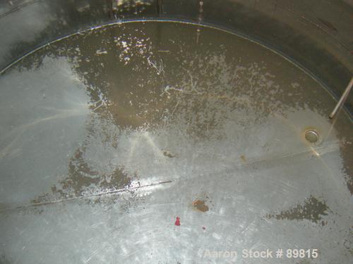 USED: Approximate 1000 gallon stainless steel tank. Approximately 6' diameter x 5' straight side. Flat top and bottom, insulated..