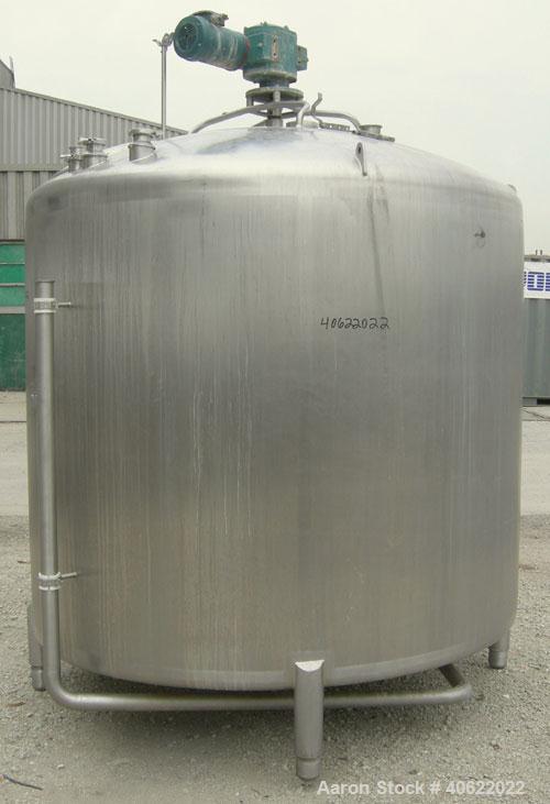 Used APV Crepaco Tank, 1500 Gallon, 304 Stainless Steel, Vertical. 84" diameter x 66" straight side. Dish top, sloped bottom. Fixed stainless steel agitator bridge with a 2" diameter bottom supported...