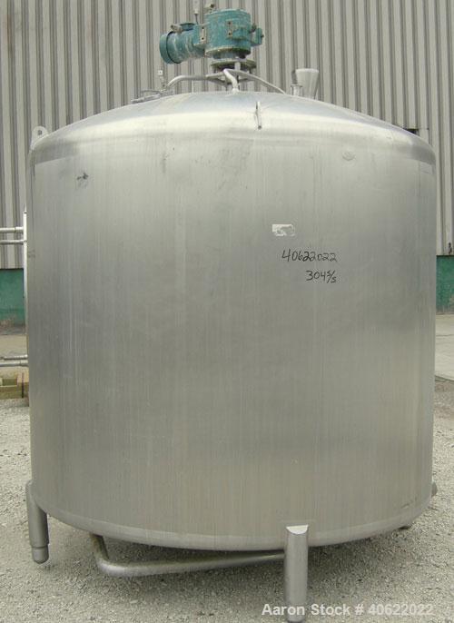 Used- APV Crepaco Tank, 1500 Gallon, 304 Stainless Steel, Vertical. 84" diameter x 66" straight side. Dish top, sloped botto...