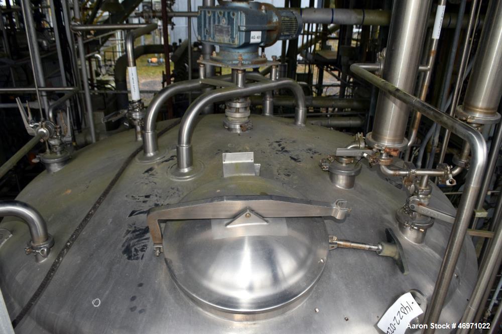 Used APV Crepaco Tank, 1500 Gallon, 304 Stainless Steel, Vertical. Approximate 84" Diameter x 56" straight side, dished top, 35 degree coned bottom. Internal rated 15 psi at 200 degrees F. Top enteri...