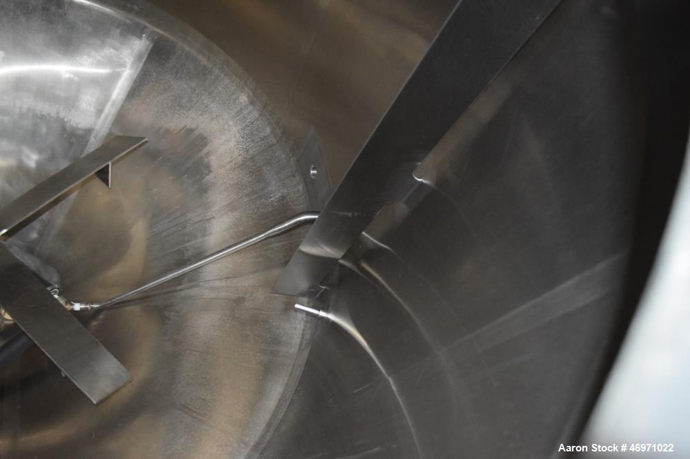 Used APV Crepaco Tank, 1500 Gallon, 304 Stainless Steel, Vertical. Approximate 84" Diameter x 56" straight side, dished top, 35 degree coned bottom. Internal rated 15 psi at 200 degrees F. Top enteri...