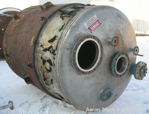 Used Acme Tank, 1500 Gallon, 304 Stainless Steel, Vertical. 72" Diameter x 84" straight side, dished top and bottom. Carbon steel jacket on partial sidewall and bottom head, no rating. Top entering L...