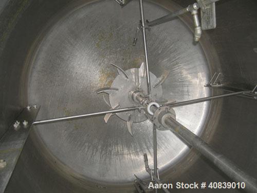 Used Acme Tank, 1500 Gallon, 304 Stainless Steel, Vertical. 72" Diameter x 84" straight side, dished top and bottom. Carbon steel jacket on partial sidewall and bottom head, no rating. Top entering L...