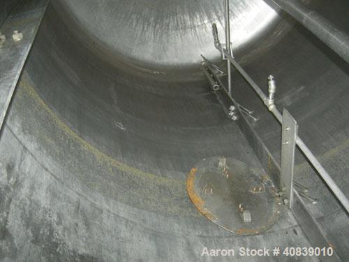 Used Acme Tank, 1500 Gallon, 304 Stainless Steel, Vertical. 72" Diameter x 84" straight side, dished top and bottom. Carbon steel jacket on partial sidewall and bottom head, no rating. Top entering L...