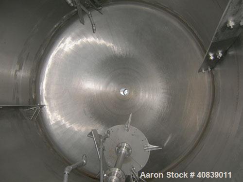 Used Acme Tank, 1500 Gallon, 304 Stainless Steel, Vertical. 72" diameter x 84" straight side. Dish top and bottom. Carbon steel jacket on partial sidewall and bottom head, no rating. Top entering Lig...