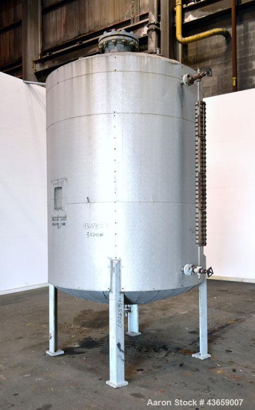 Used Arrow Tank & Engineering Pressure Tank, 1200 Gallons, 304L Stainless Steel, Vertical. Approximate 66” diameter x 75” straight side, dished top and bottom. Internal rated Full Vacuum & 50psi at -...