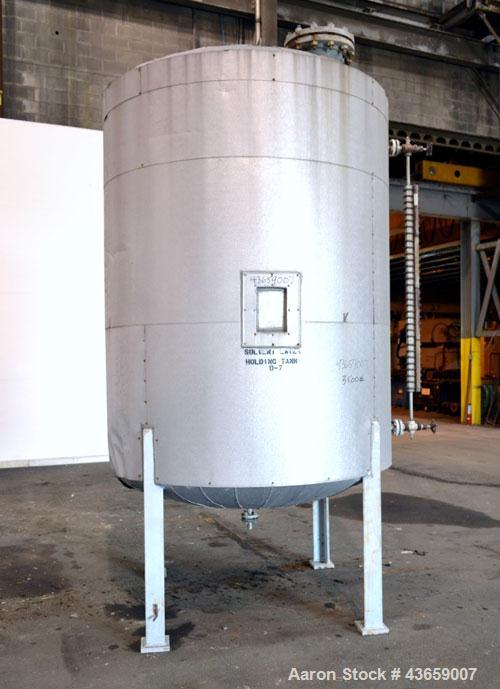 Used Arrow Tank & Engineering Pressure Tank, 1200 Gallons, 304L Stainless Steel, Vertical. Approximate 66” diameter x 75” straight side, dished top and bottom. Internal rated Full Vacuum & 50psi at -...