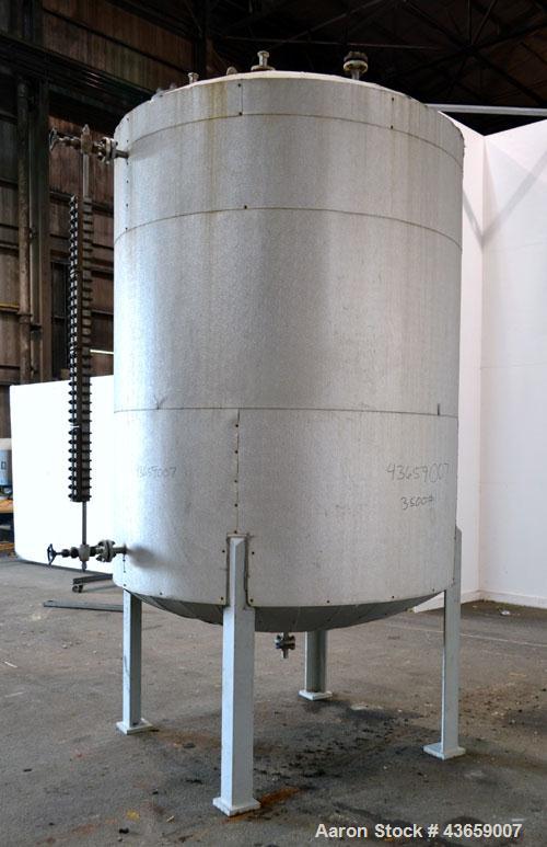 Used Arrow Tank & Engineering Pressure Tank, 1200 Gallons, 304L Stainless Steel, Vertical. Approximate 66” diameter x 75” straight side, dished top and bottom. Internal rated Full Vacuum & 50psi at -...