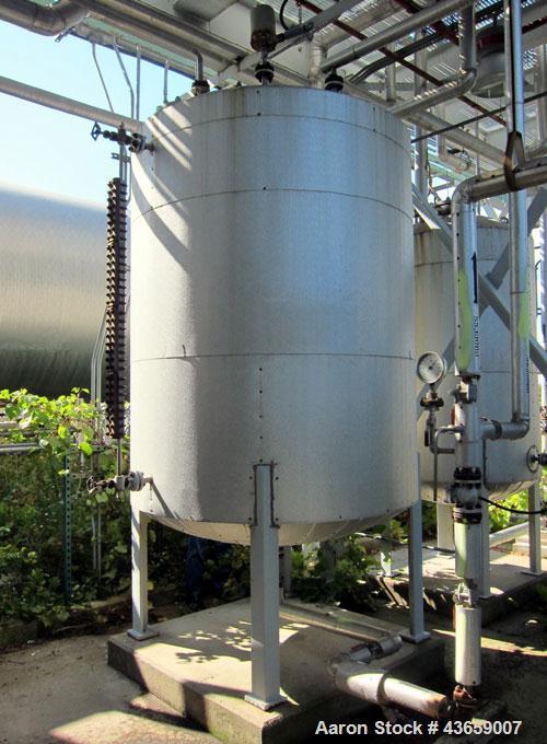 Used Arrow Tank & Engineering Pressure Tank, 1200 Gallons, 304L Stainless Steel, Vertical. Approximate 66” diameter x 75” straight side, dished top and bottom. Internal rated Full Vacuum & 50psi at -...