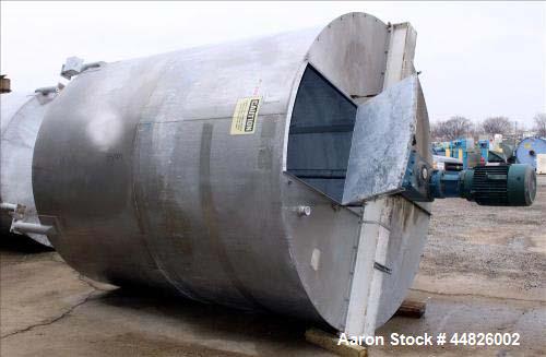 Used- Approximately 4,000 Gallon Bright Sheet Metal Tank.